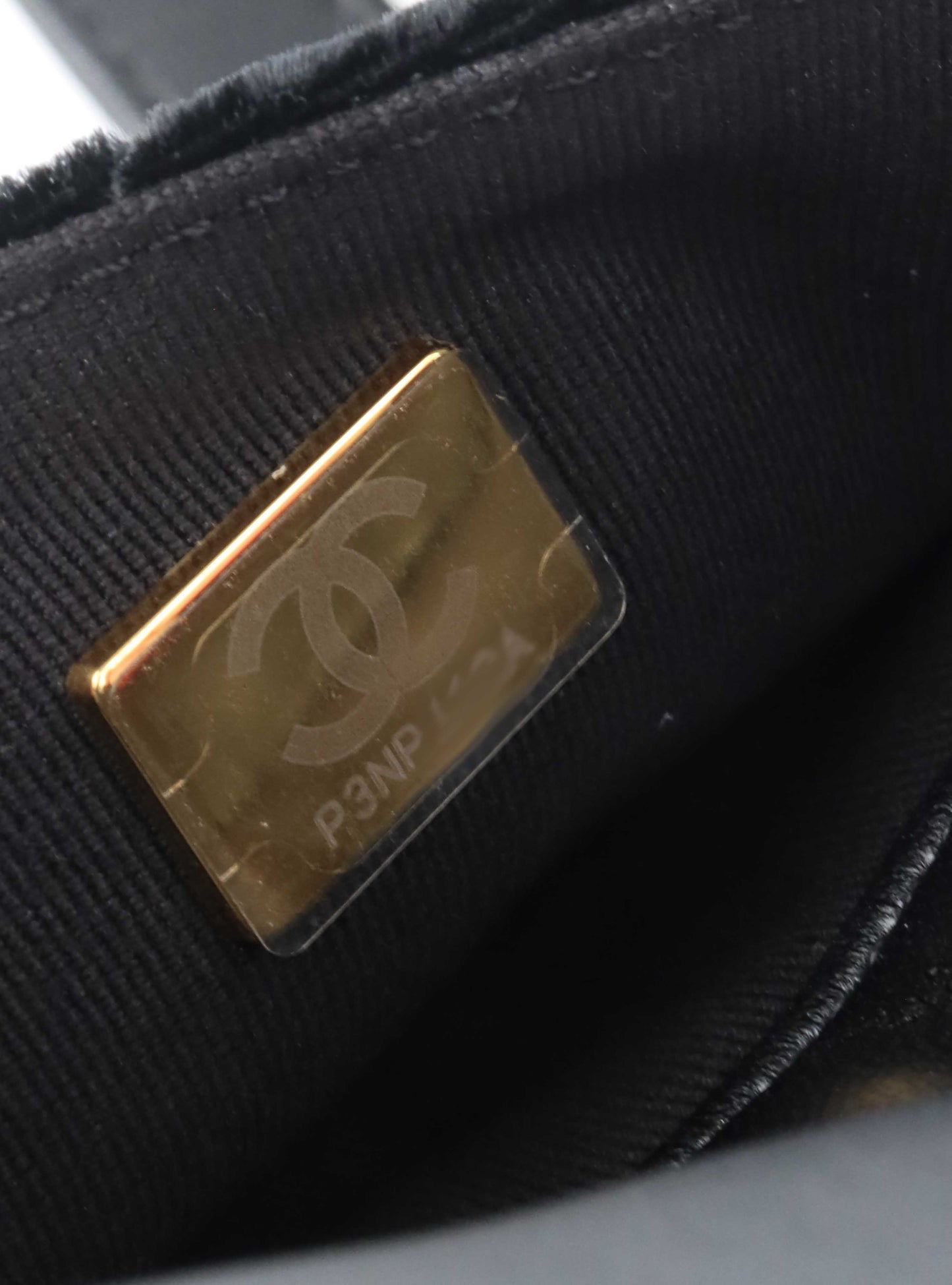 Chanel Black Small Quilted Velvet Wavy CC Hobo Bag.
