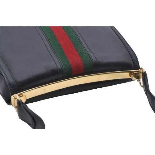 , RARE, Gucci, mod, black leather, saddle bag shoulder purse with a wide red & green center stripe, and bold gold accents g