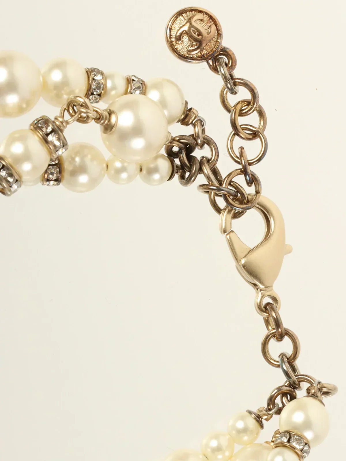 CHANEL 2013 Made Pearl Rhinestone Ribbon Motif Bracelet Gold/White
