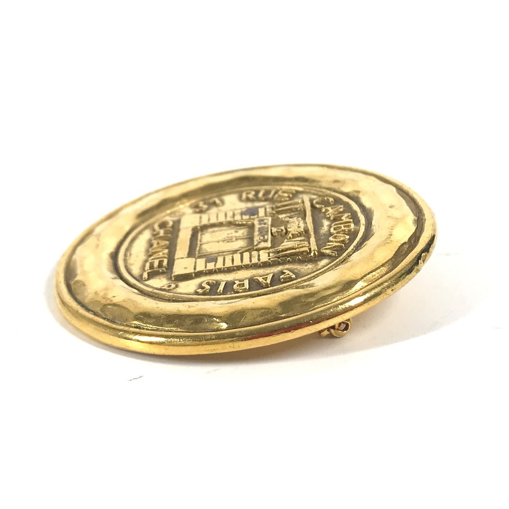 CHANEL Brooch metal gold round logo Women
