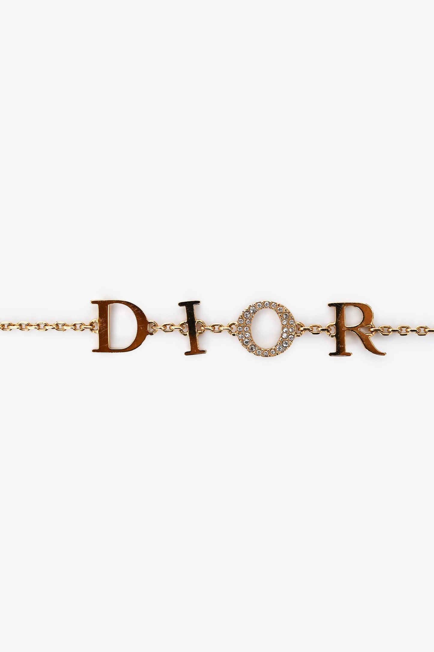 Christian Dior Gold Tone Metal Crystal Set Logo Bracelet
