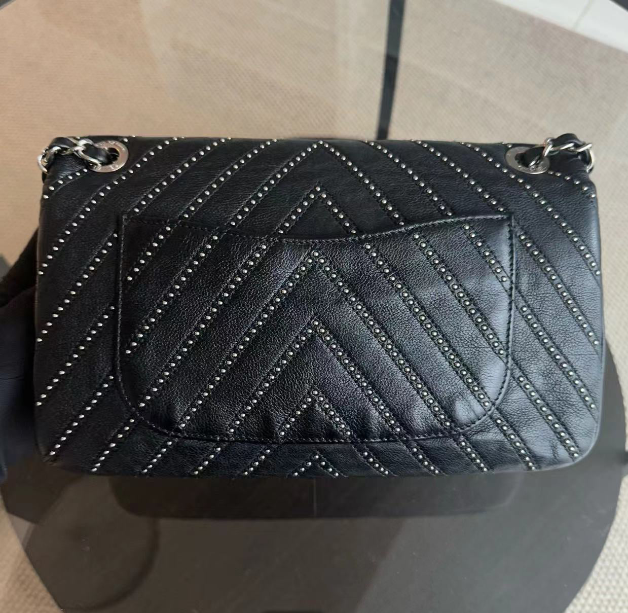 Chanel Seasonal Flap - Studded 25CM Chevron Calfskin Black Silver Hardware Series 24