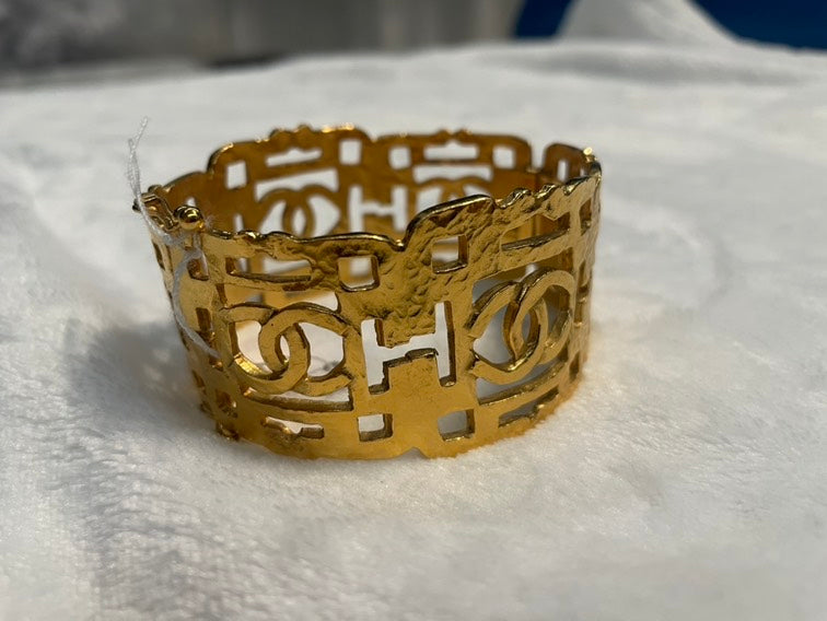 Chanel Gold Metal Cutout Cuff Bracelet