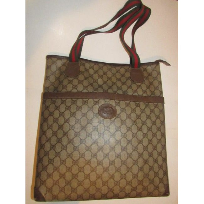 Gucci   Leather And Large G Logo Print Coated Canvas In Shades Of Brown