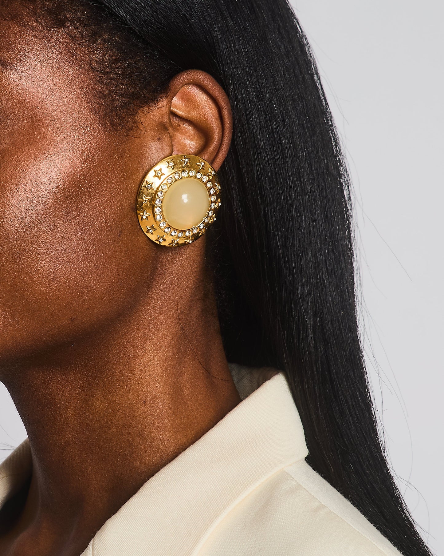 Chanel 2003   Gold Large Round Clip On Earrings with Beige Stone, Stars and Crystal Embellishments