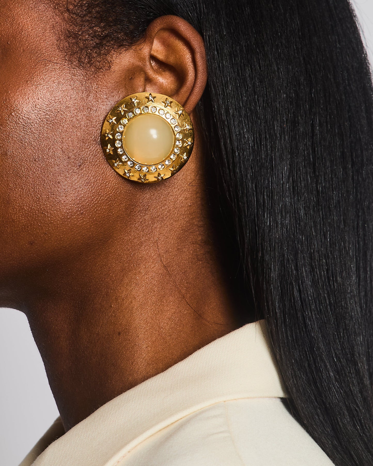 Chanel 2003   Gold Large Round Clip On Earrings with Beige Stone, Stars and Crystal Embellishments