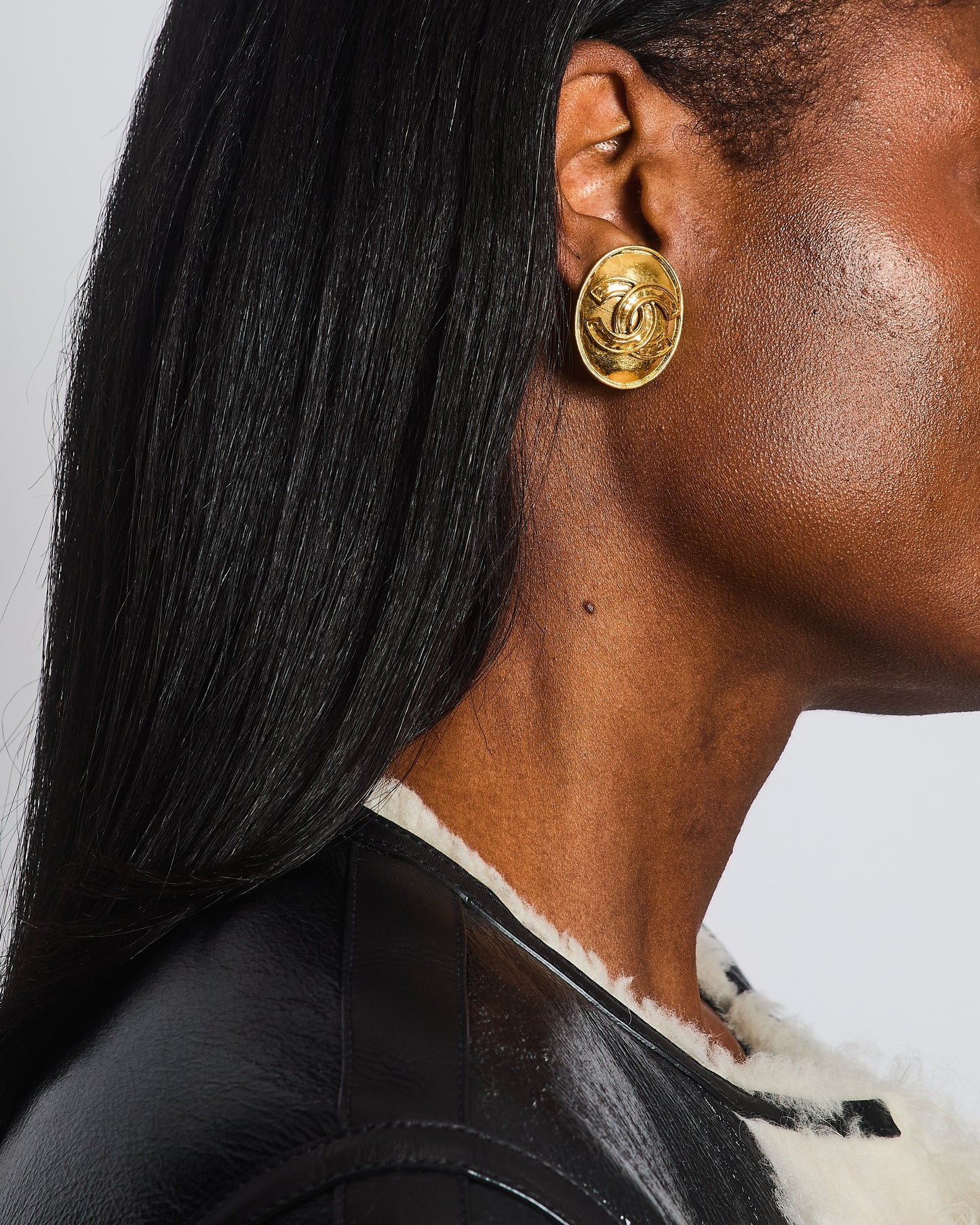 Chanel   94P Gold Polished Oval Clip On Earrings with CC Logo