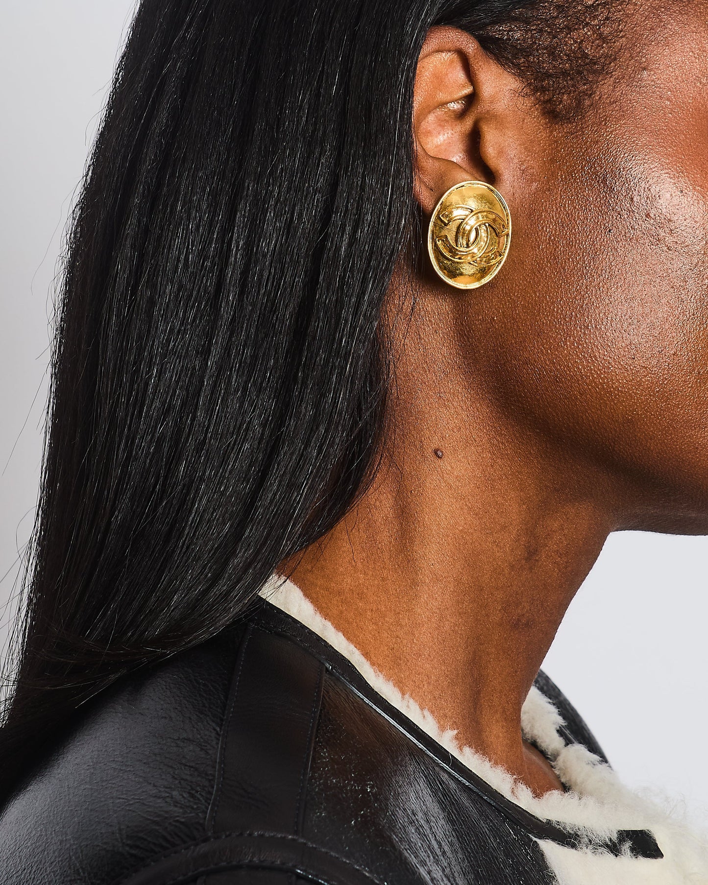 Chanel   94P Gold Polished Oval Clip On Earrings with CC Logo