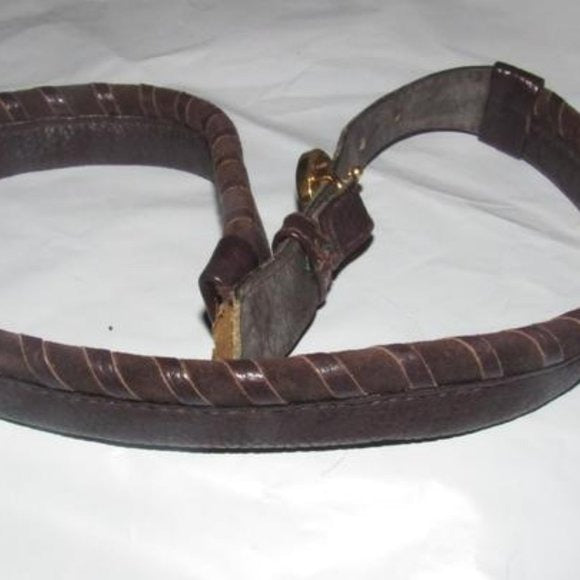Early,  , Gucci, brown whip-stitched, leather belt with a round, gold & enamel buckle