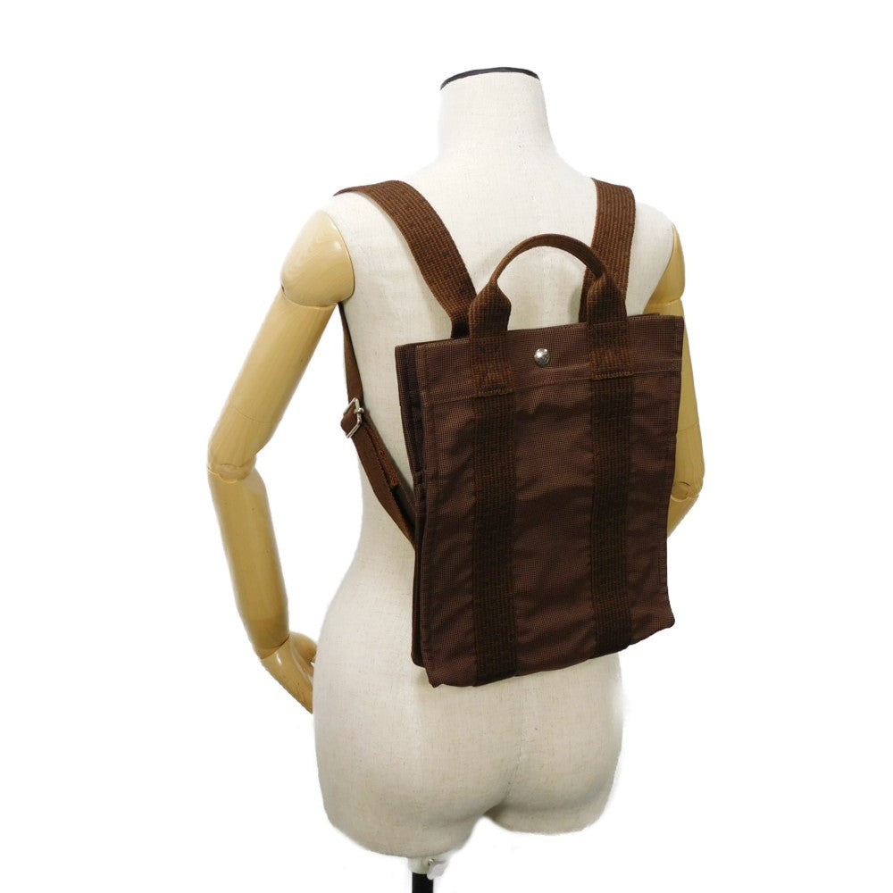 HERMES Backpack Nylon canvas (polyamide x polyester) Brown Serie button Her Line Sac Ad PM mens(Unisex)  d