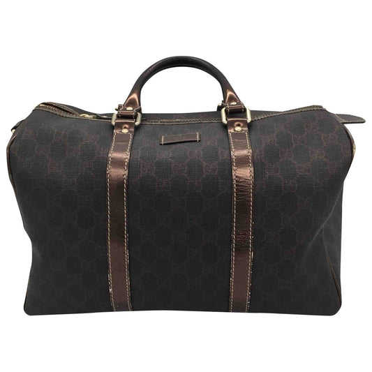 Gucci brown cloth travel bag