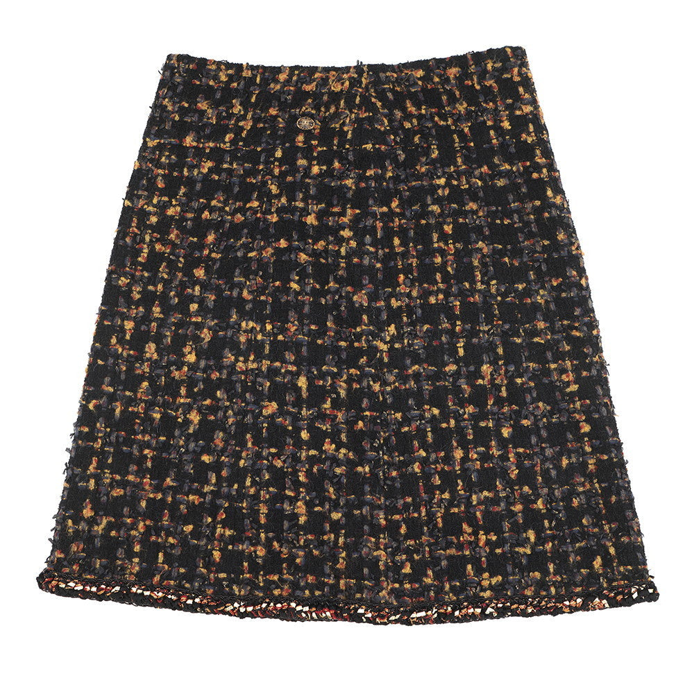 CHANEL Tweed 4-pocket collarless jacket and skirt set with Gripoa buttons Size Jacket36/Skirt38 Black/Yellow/Navy/Bordeaux/GoldP61915V47013 Cotton44% Polyamide31% Silk12% Acetate9% Mohair 4%
