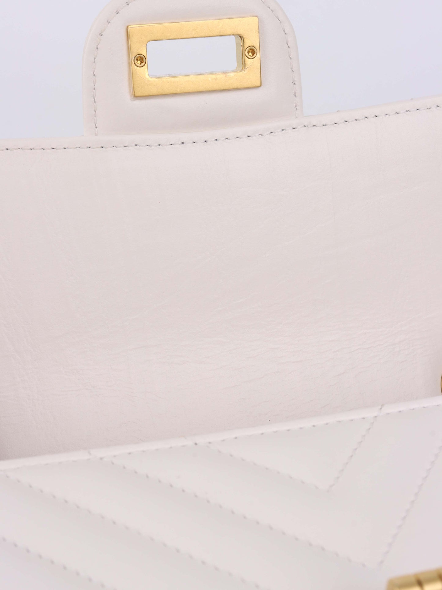 Chanel Small White Chevron 2.55 Bag.