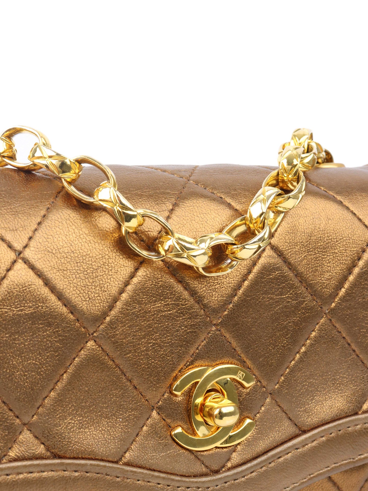 Chanel Gold Matellic   Chain Bag.