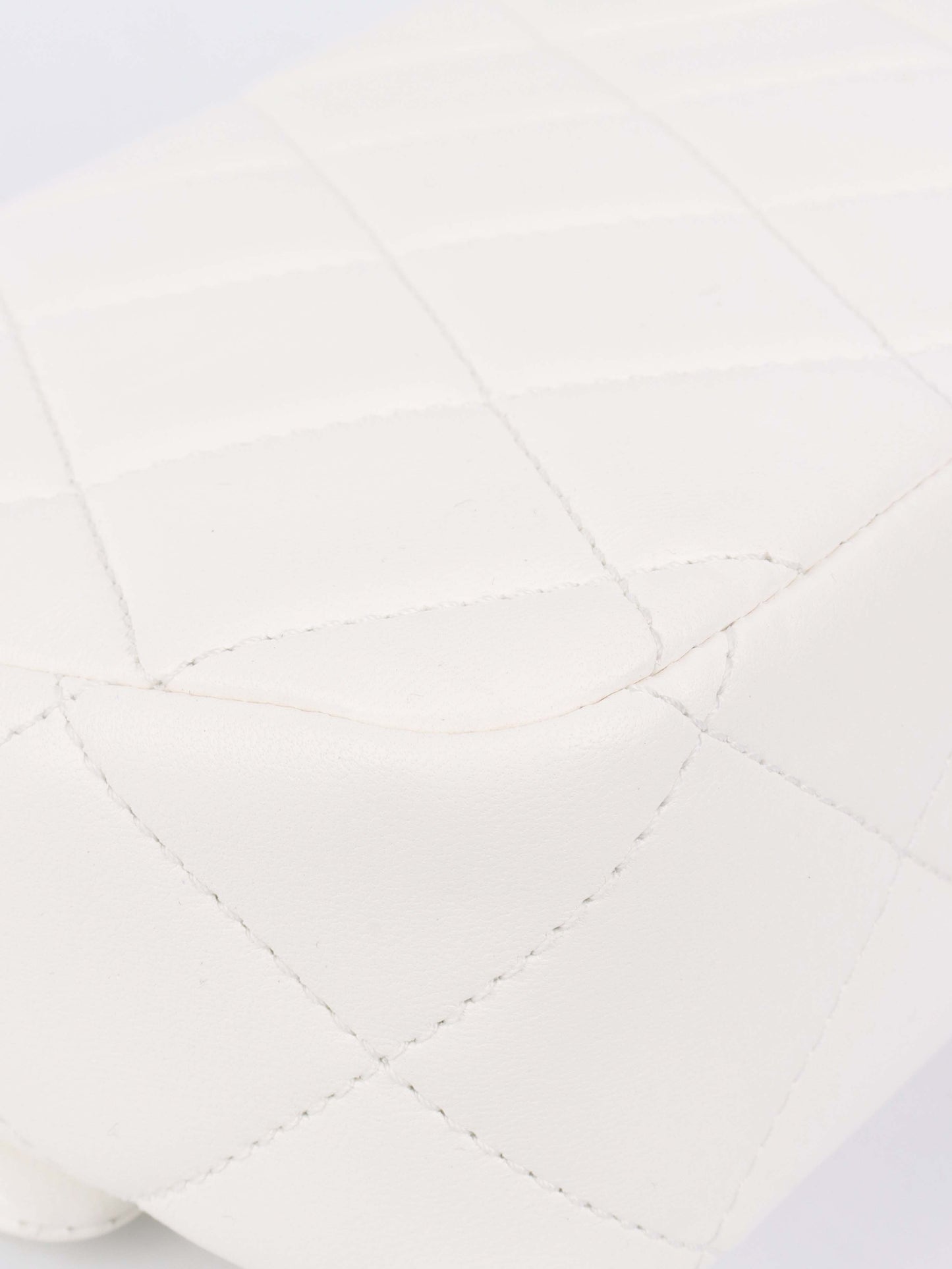 Chanel White and Pearl Chain Flap Bag.