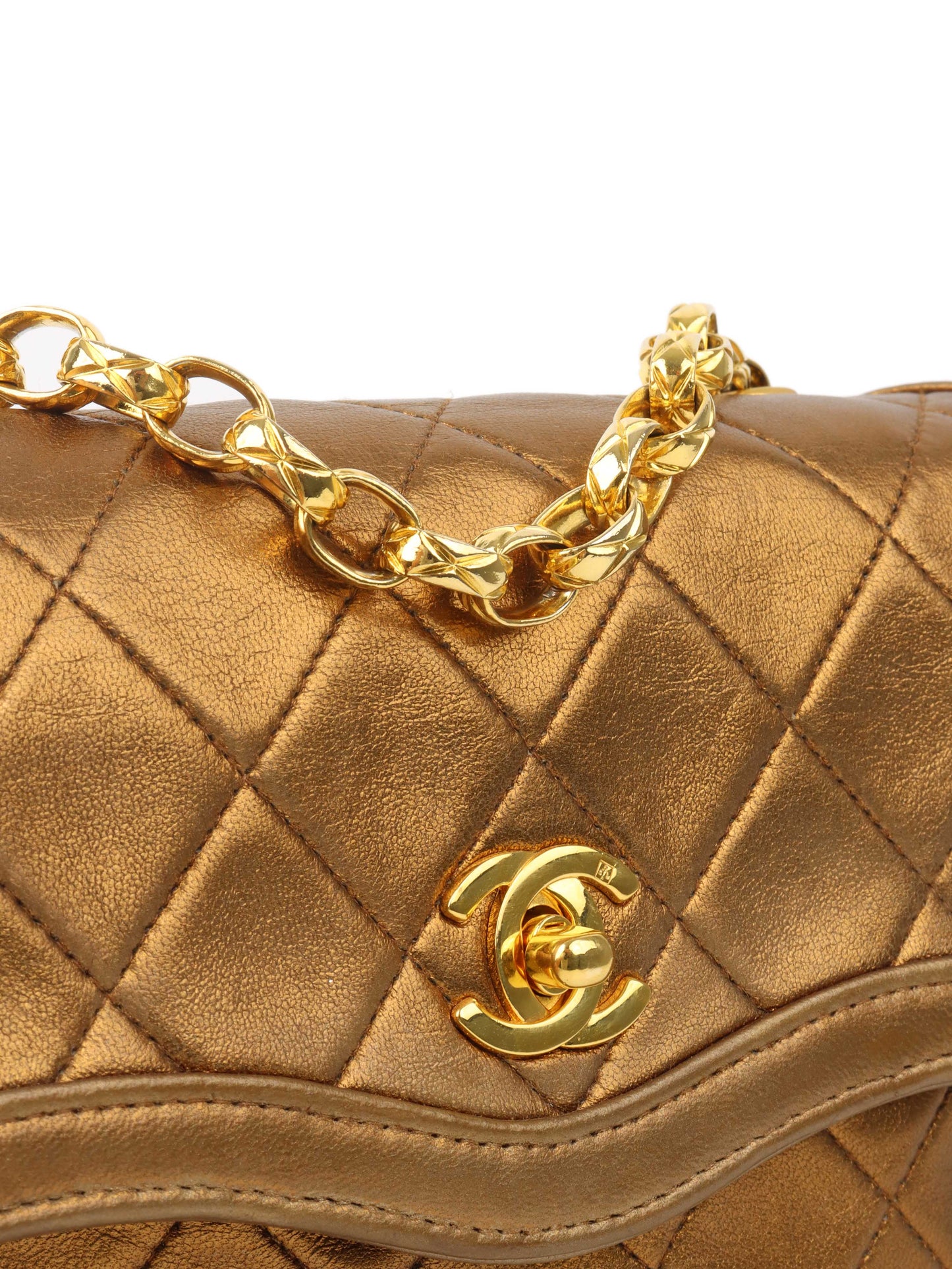 Chanel Gold Matellic   Chain Bag.