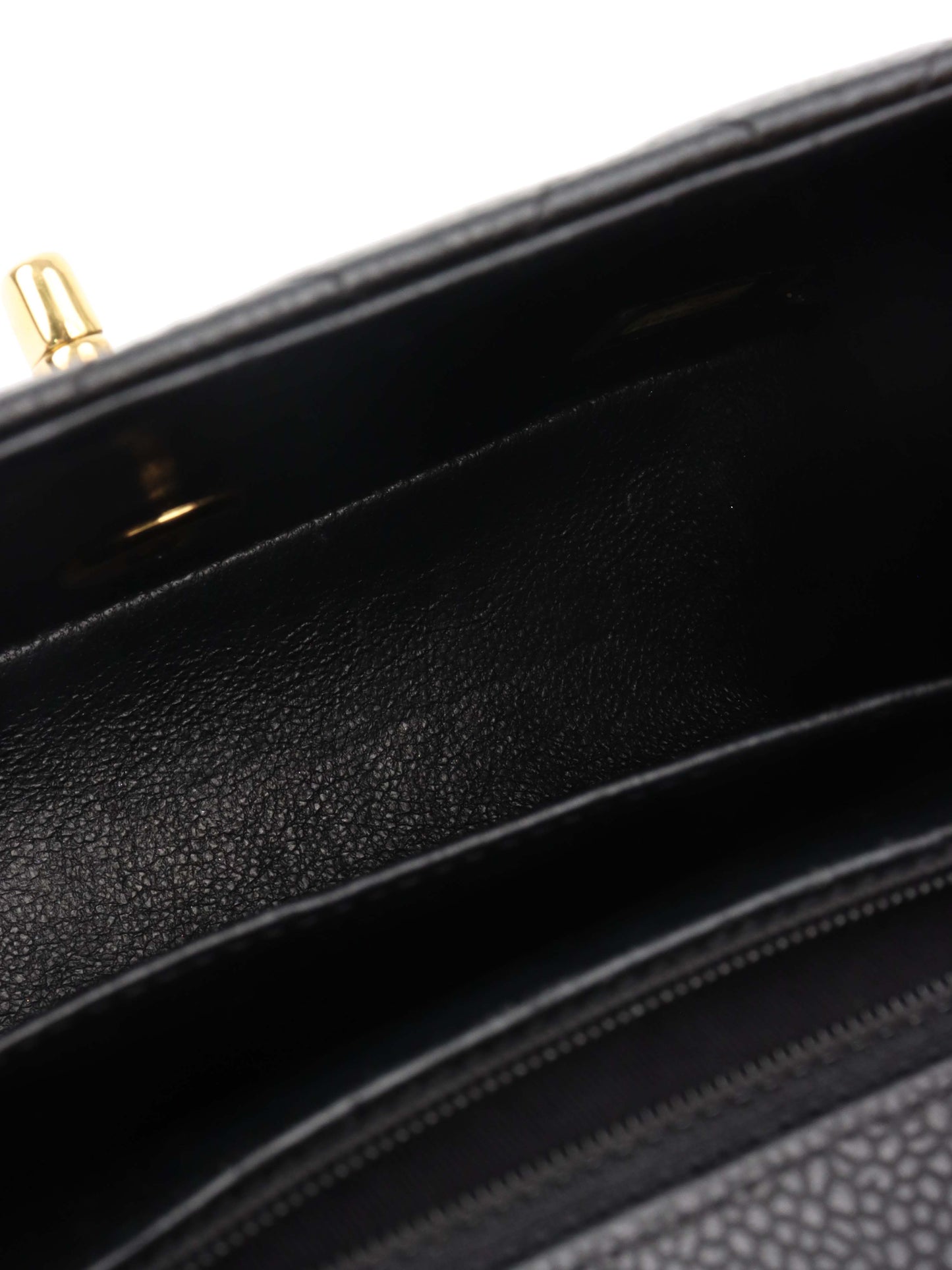 Chanel Black Mini Caviar Square Flap Bag.