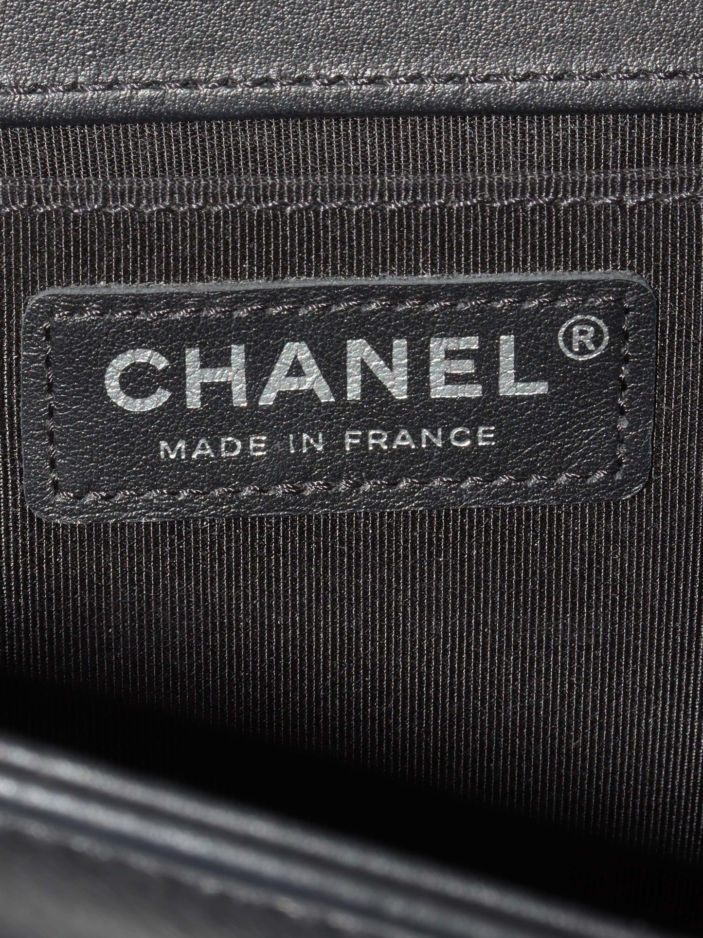 Chanel So Black Medium Lambskin Boy Bag.