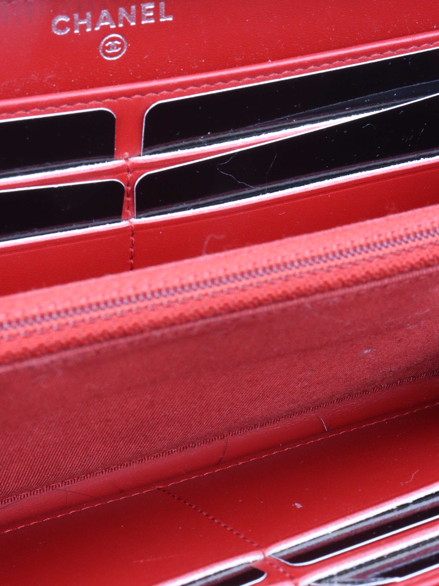 Chanel Red Caviar Zip Around Wallet.