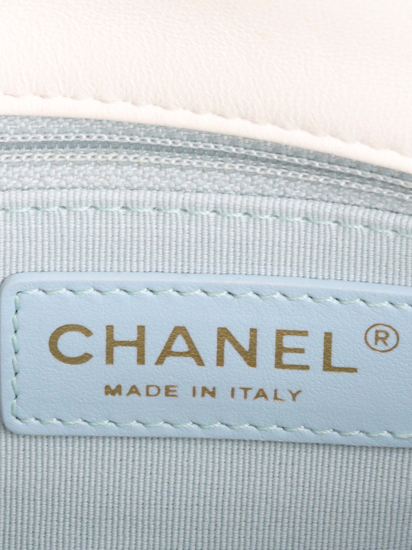 Chanel White and Pearl Chain Flap Bag.