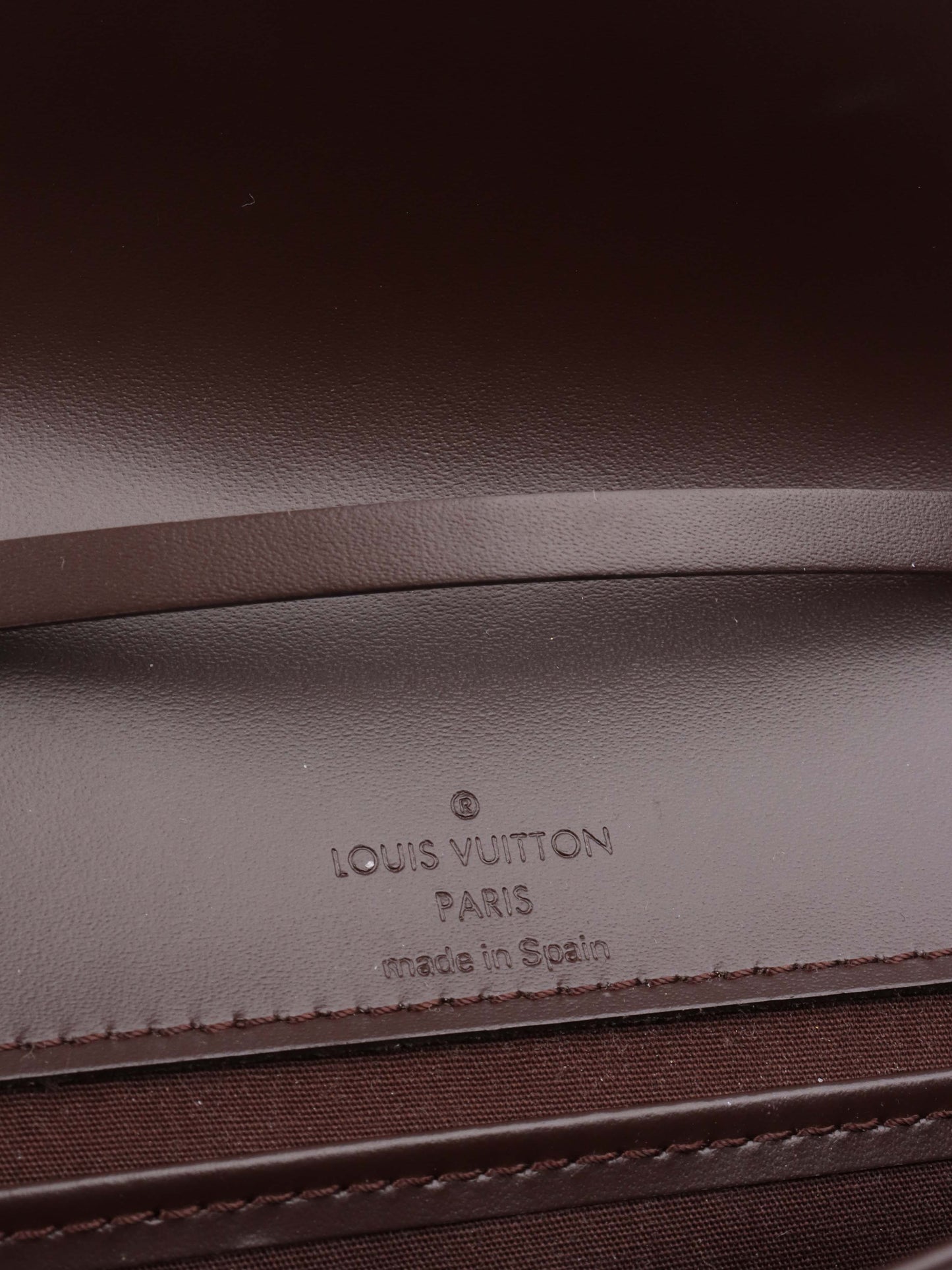 Louis Vuitton Brown Epi Leather Honfleur Clutch.