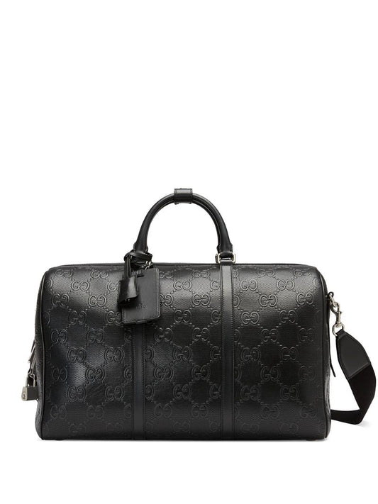 Gucci - logo-embossed holdall - men - Cotton/Linen/Flax/Leather - One Size - Black