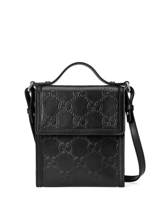 Gucci - embossed GG motif messenger bag - men - Cotton/Linen/Flax/Leather - One Size - Black