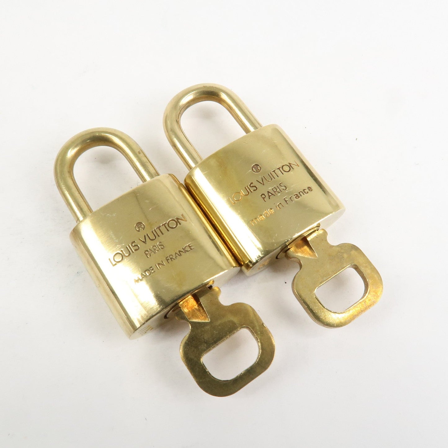 Louis Vuitton Set of 10 Lock & Key Cadena Key Lock Metal Gold