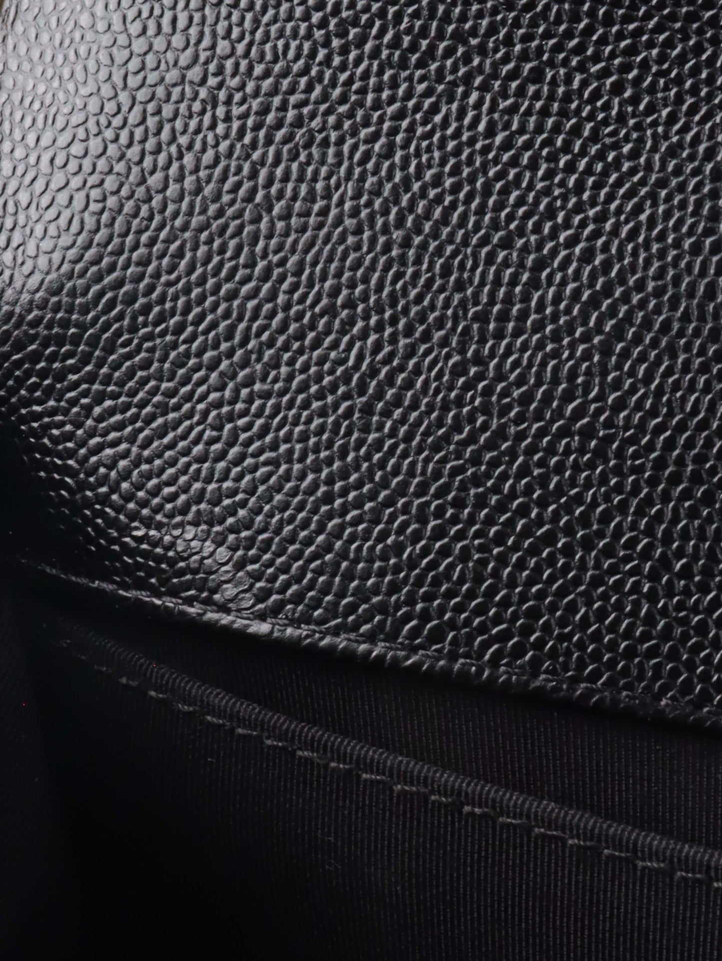 Chanel Black Chevron Caviar Medium Boy Bag.