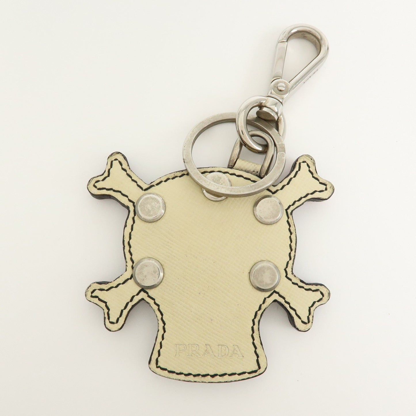 PRADA Saffiano Leather Metal Skull Bag Key Charm Key Holder Ivory