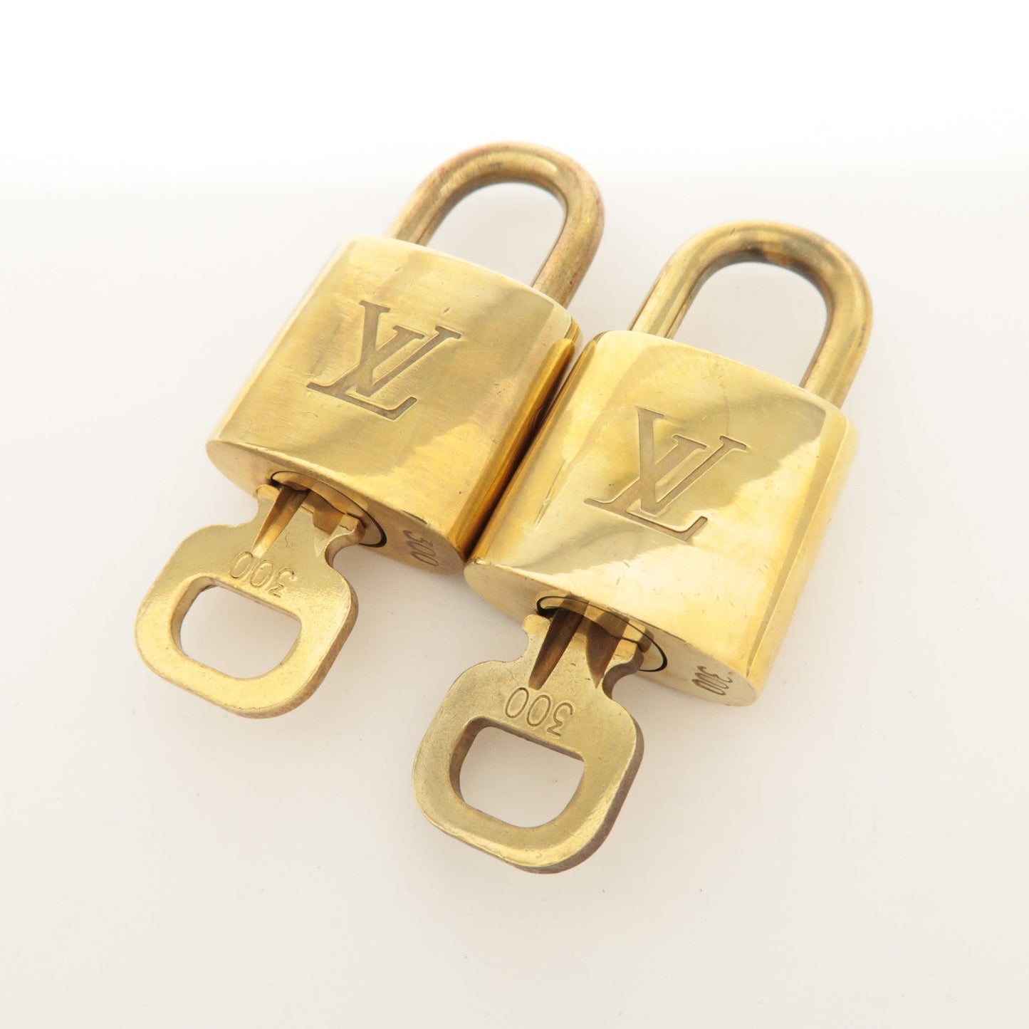 Louis Vuitton Set of 10 Lock & Key Cadena Key Lock Metal Gold  d