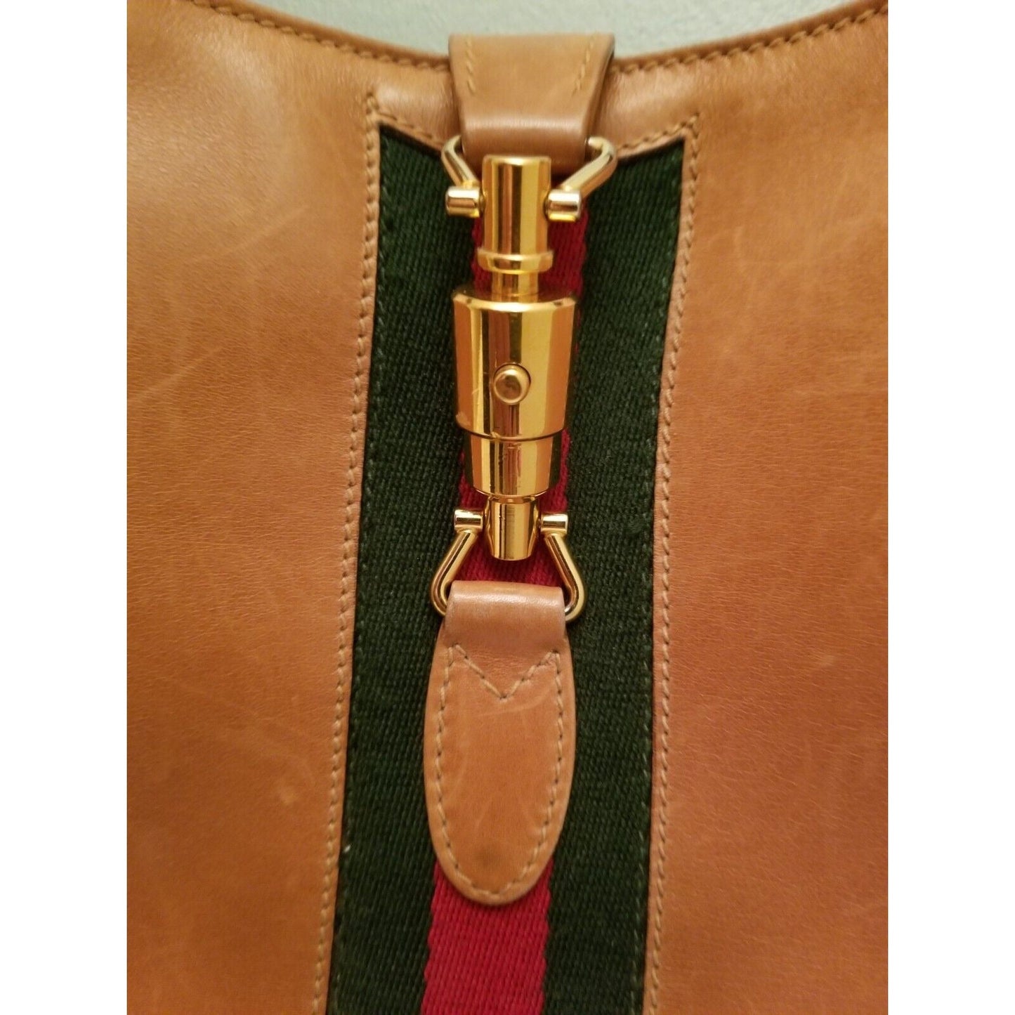 Rare,  , Gucci, camel leather 1961 Jackie hobo shoulder bag with a red & green center stripe, gold piston closure, & extender strap