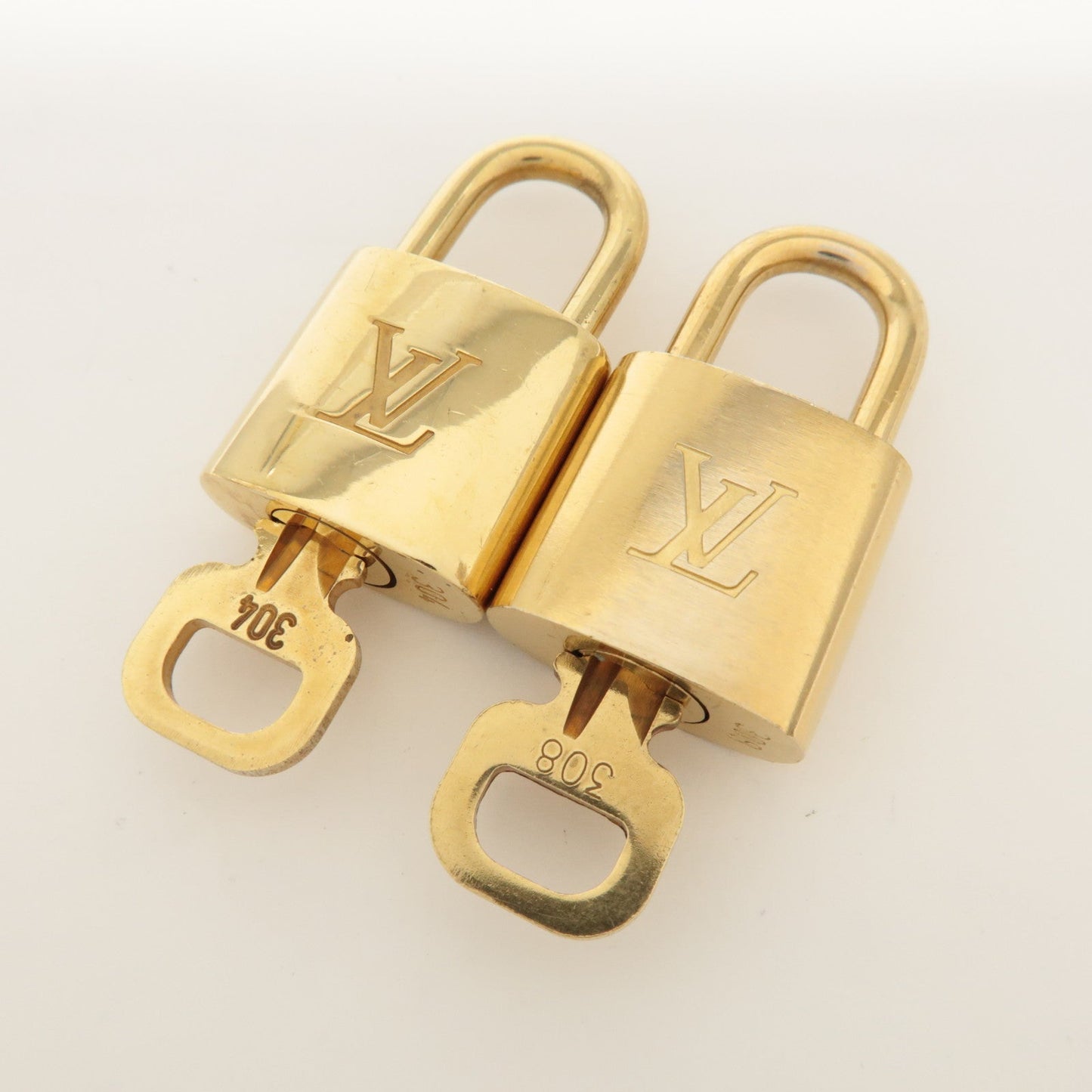 Louis Vuitton Set of 10 Lock & Key Cadena Key Lock Metal Gold