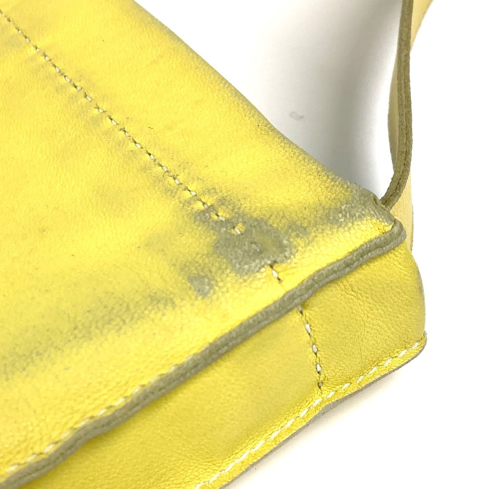 HERMES Shoulder Bag leather yellow Punching logo Crude cell Women  d