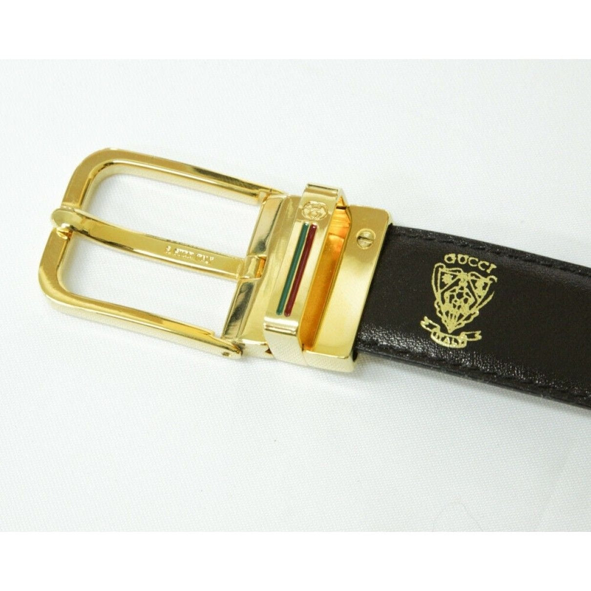 , NOS, Gucci, brown or black leather, reversible belt with a removable, rectsngular gold tone buckle with red and green enamel