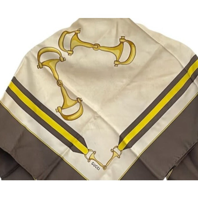 , Gucci, equestrian print, 35" square, 100 % silk scarf in brown, gold, & black on a white background with a wide brown border