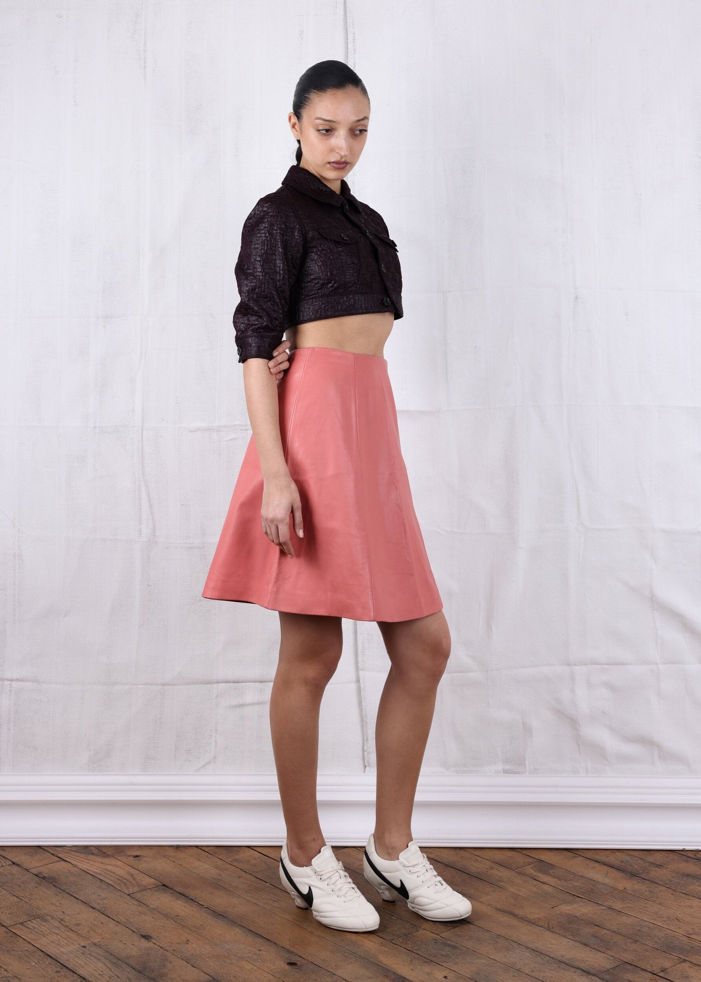 Prada Coral A-lined leather midi skirt