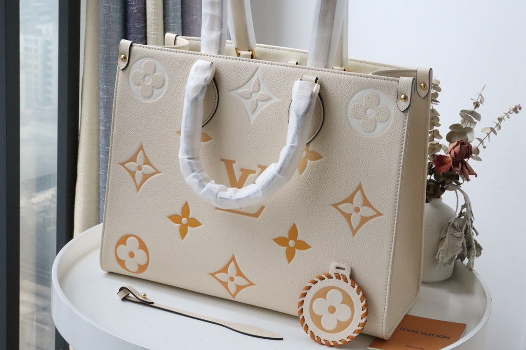Top Quality OnTheGo MM Tote Bag Monogram Empreinte Cream For The Pool Collection, WoHandbags 13.8in/35cm Top Quality M45717