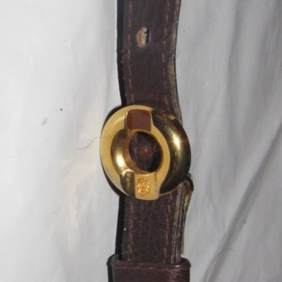 Early,  , Gucci, brown whip-stitched, leather belt with a round, gold & enamel buckle
