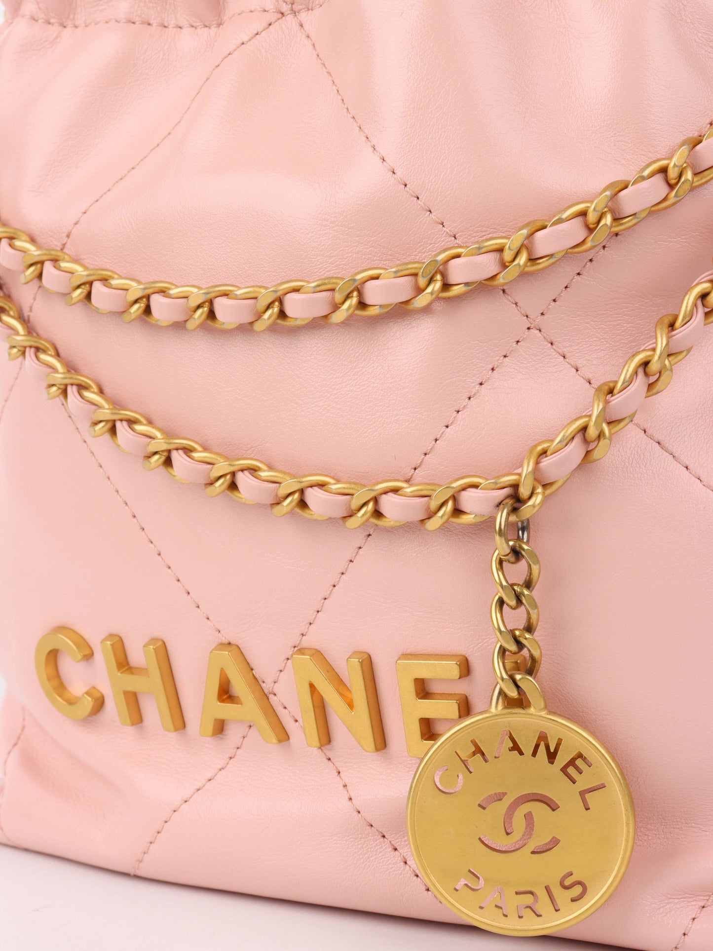 CHANEL 22 Mini Light Pink Handbag.
