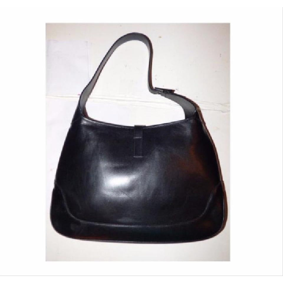 - Gucci, extra large size, classic, Jackie- O bag, made in hard to find,black all leather with a chrome piston closure and buckle