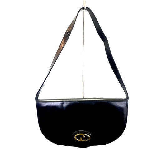 , rare, black leather, Gucci shoulder bag with a large, two-tone 'GG' emblem and removable strap