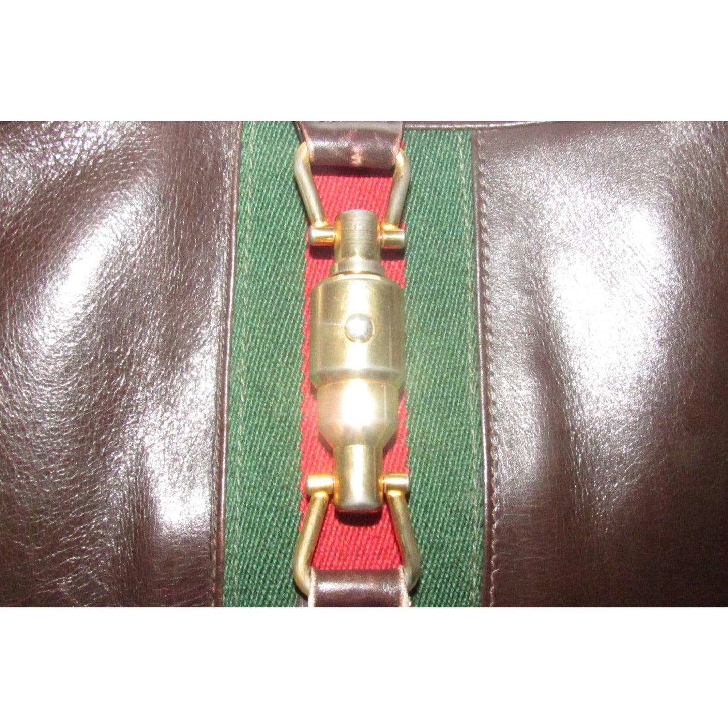 Rare,  , Gucci, 1961 Jackie, glossy brown leather hobo style shoulder bag with a red and green center stripe & gold piston closure