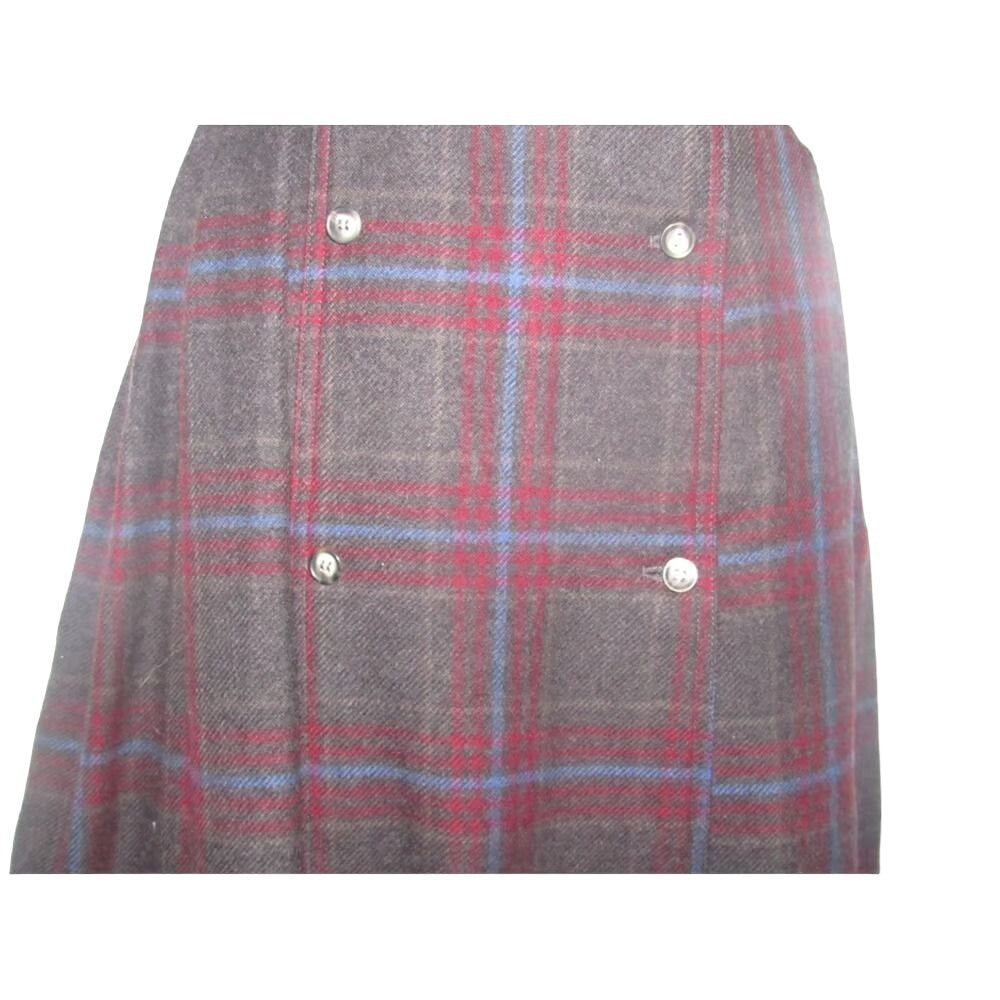 , Gucci, multicolored plaid cashmere blend, 'school girl' midi skirt with knife pleats, a button up front, & a sewn in lining