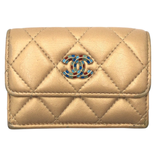 Chanel Matelassé Coco Mark Leather Trifold Wallet