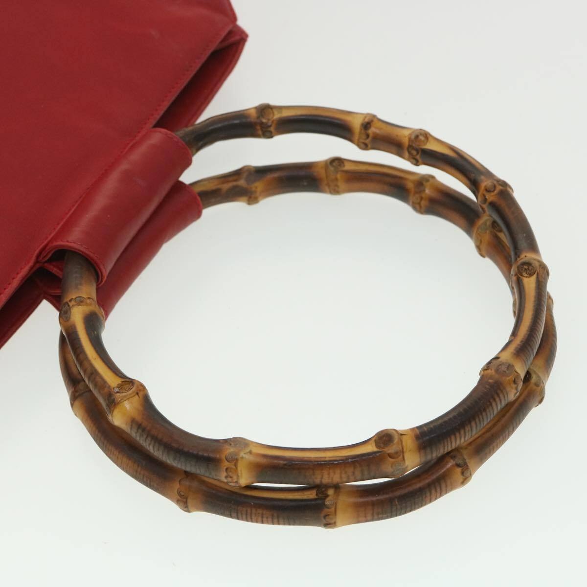 , mod look, Gucci, true red leather shopper with two round bamboo handles, a footed bottom, and gold accents