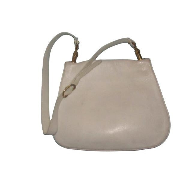 1970s Gucci white textured leather Blondie style saddle bag with XL gold GG logo cutout in mint condition