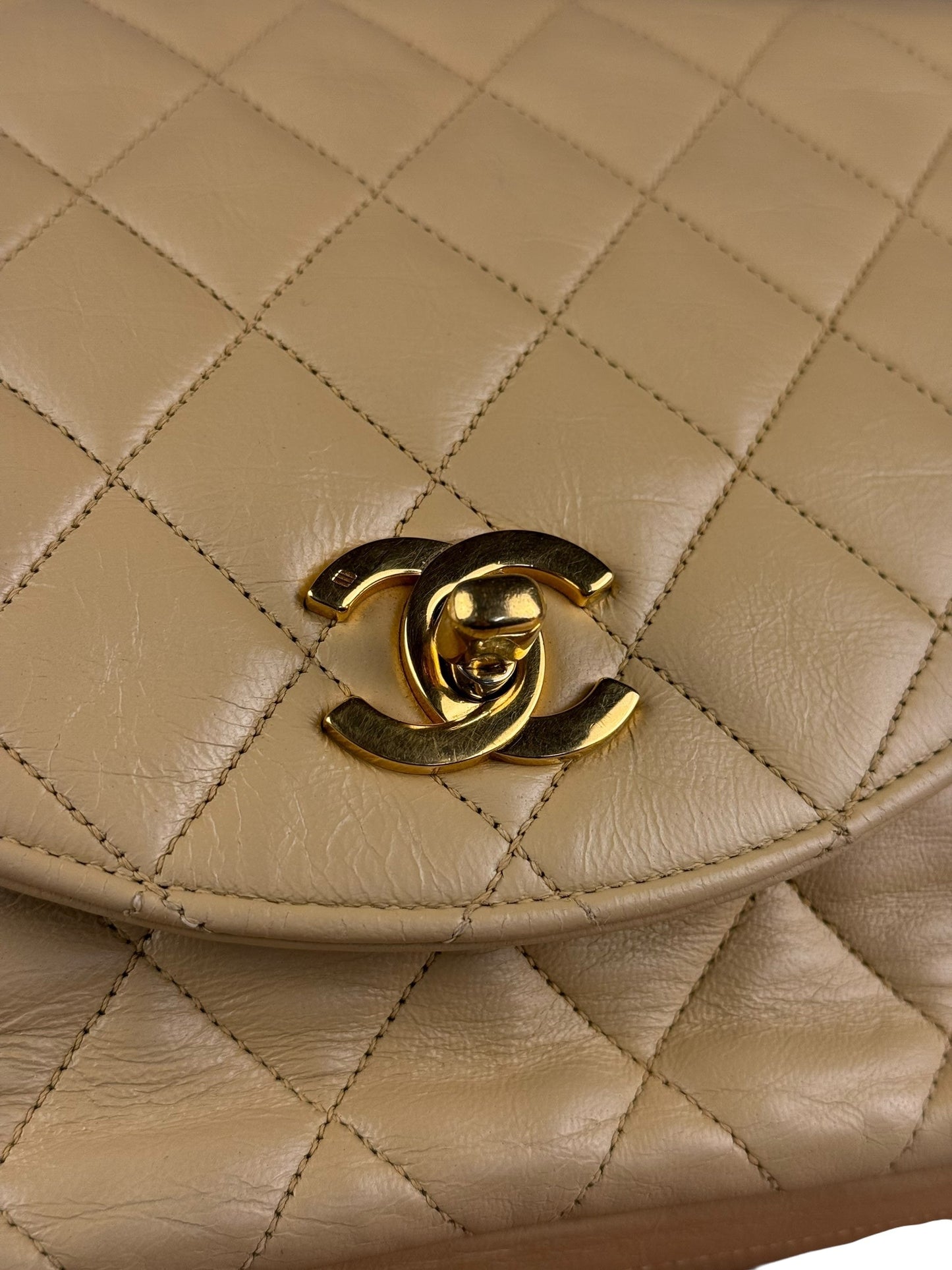 Chanel 1986 Beige Curved Flap Bag