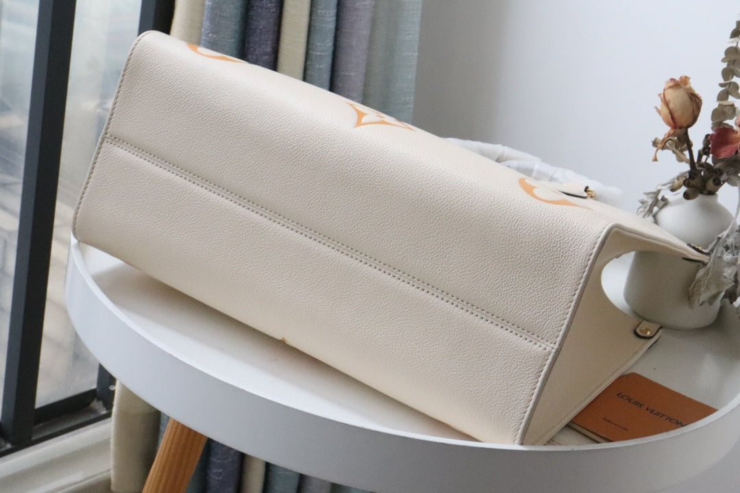 Top Quality OnTheGo MM Tote Bag Monogram Empreinte Cream For The Pool Collection, WoHandbags 13.8in/35cm Top Quality M45717