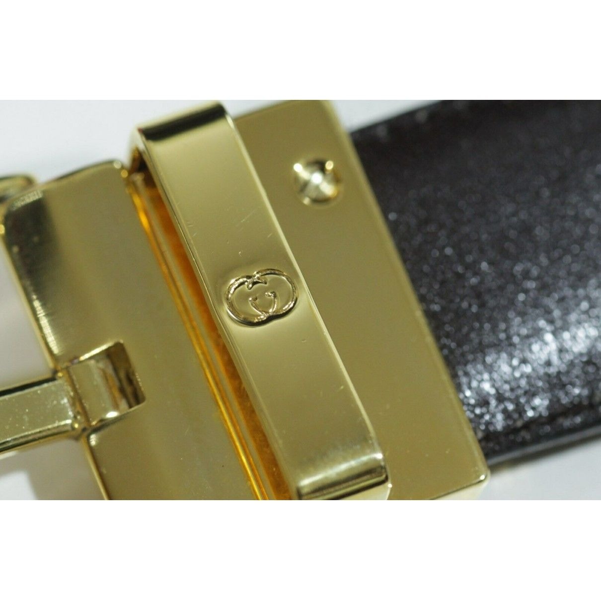 , NOS, Gucci, brown or black leather, reversible belt with a removable, rectsngular gold tone buckle with red and green enamel